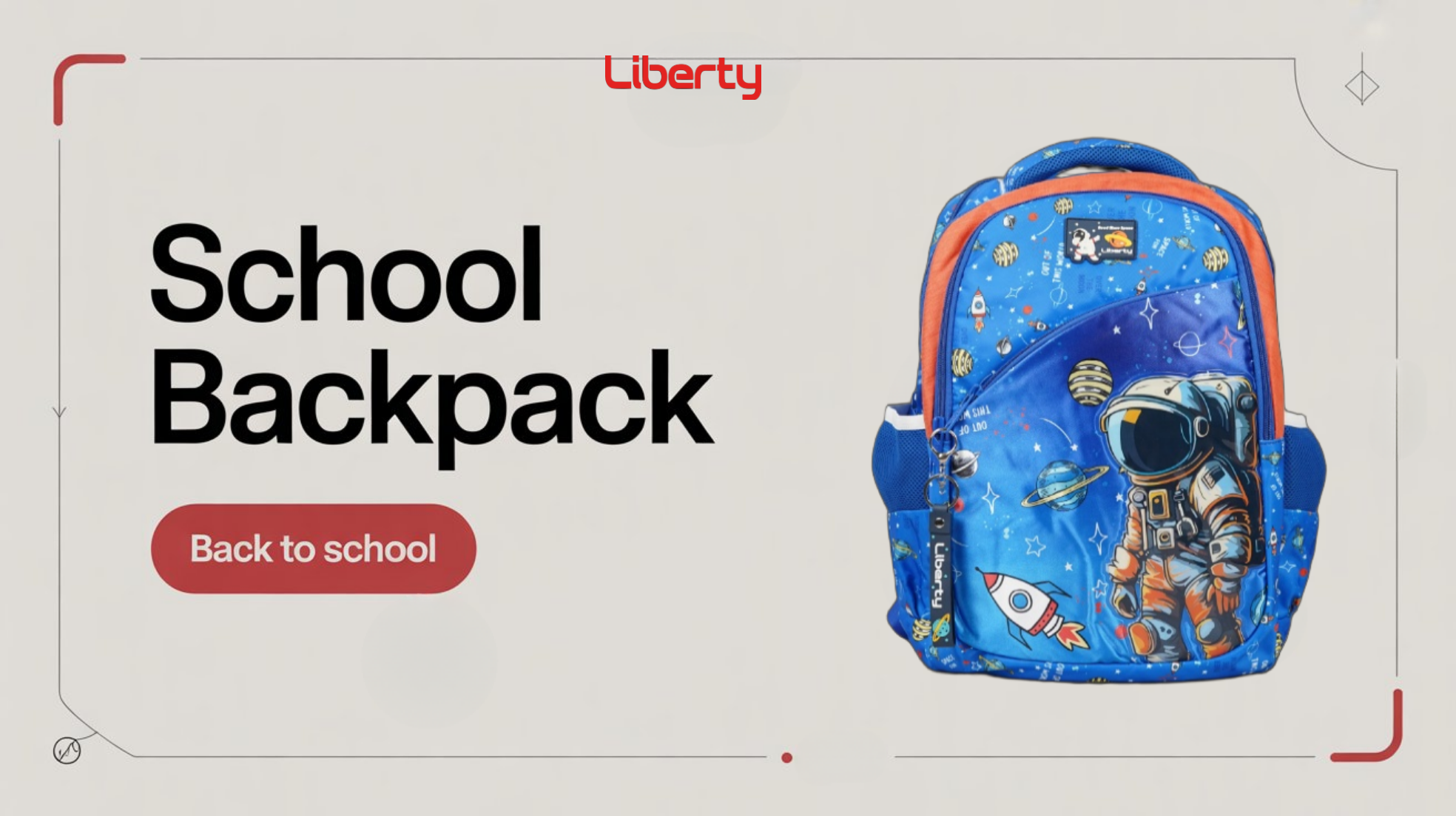 Blue school backpack with astronaut design on a gray background, featuring the Liberty brand.